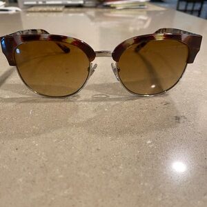 Brand new Tory Burch tortoise sunglasses. Never been worn.